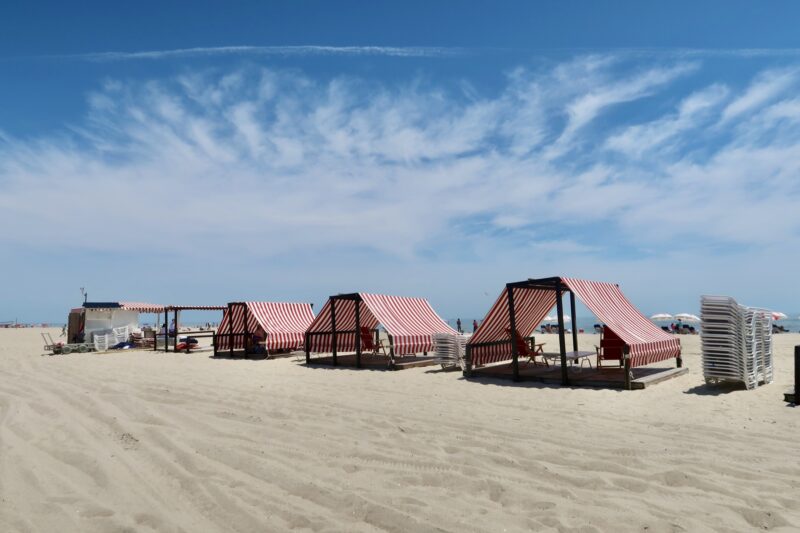 Striped tents on the beach