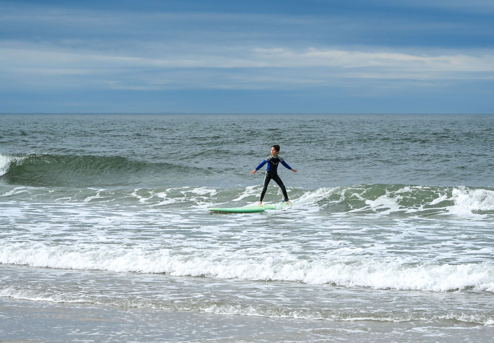 A boy Learning to Surf at the Cove.