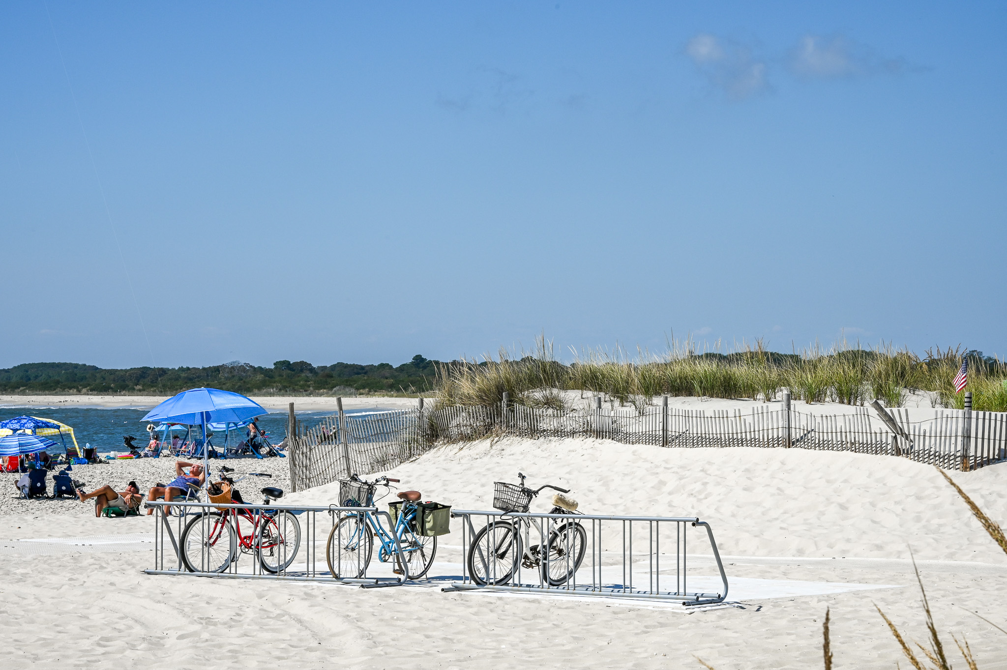 Perfect Bike Stop and people sunbathing at The Cove