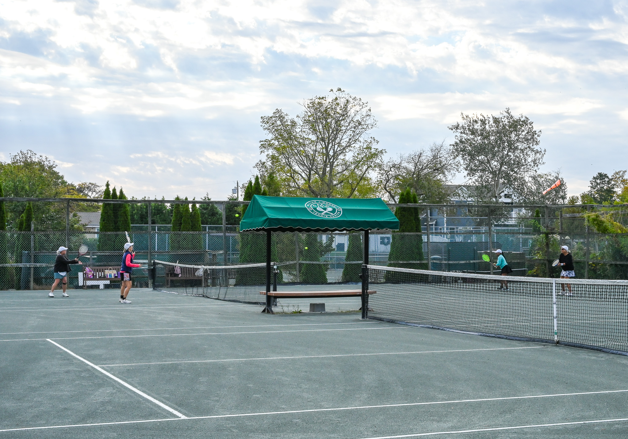 People playing Tennis at the Cape May Tennis Club