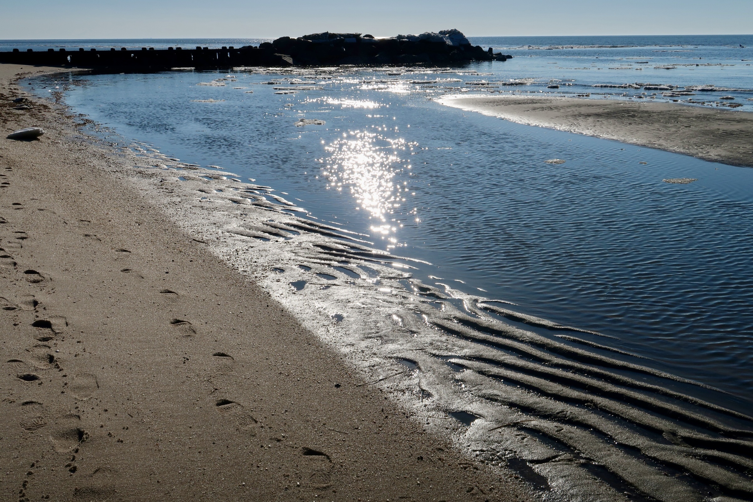 The sunlight glistening on the Delaware Bay